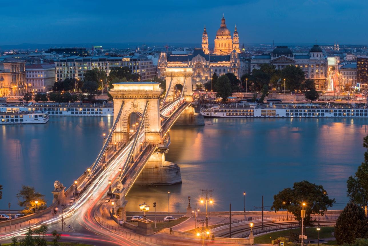 Chain Bridge over the Danube River and City Skyline at Sunset in Budapest Hungary