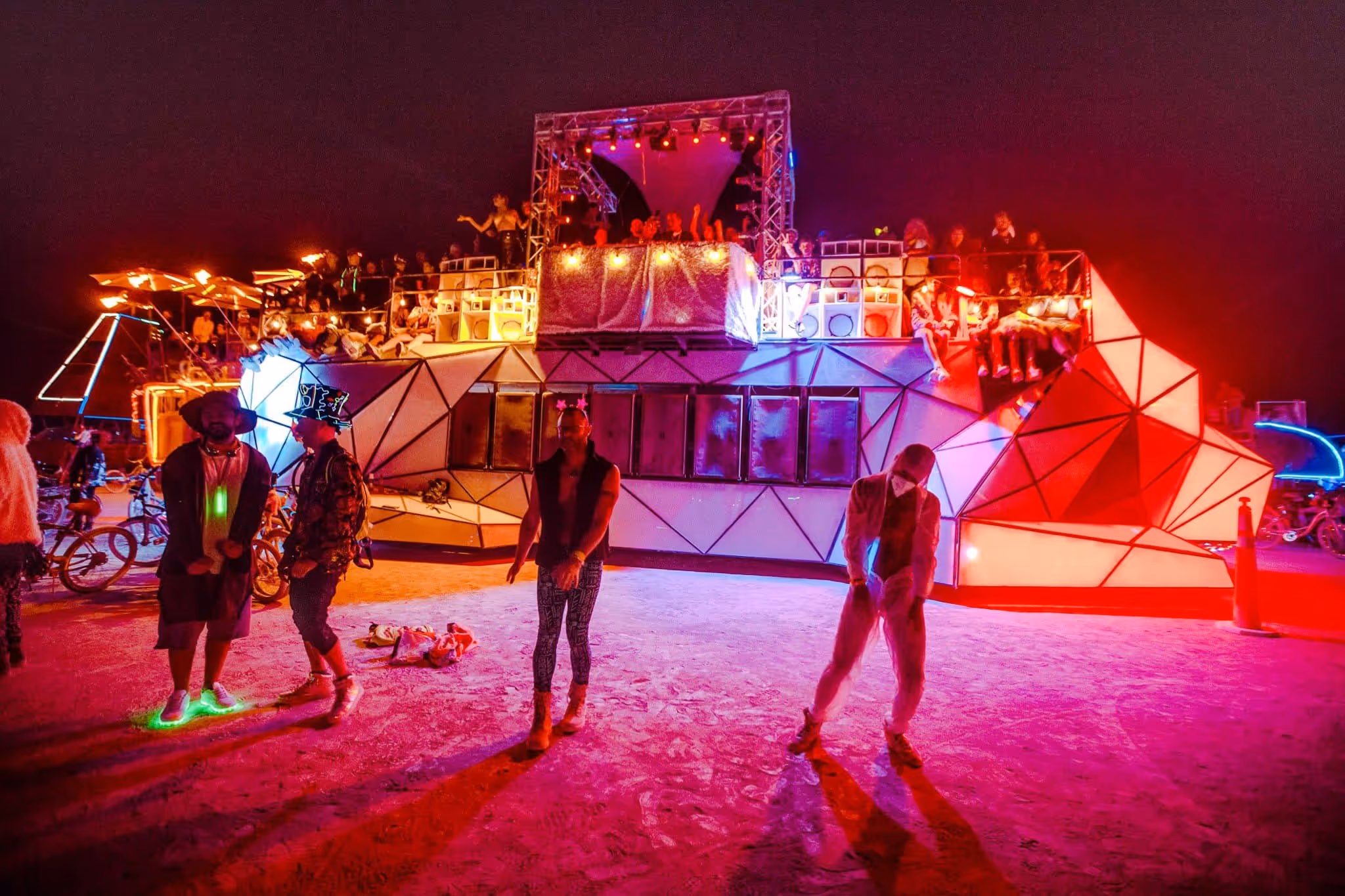 Night crowd at the art car