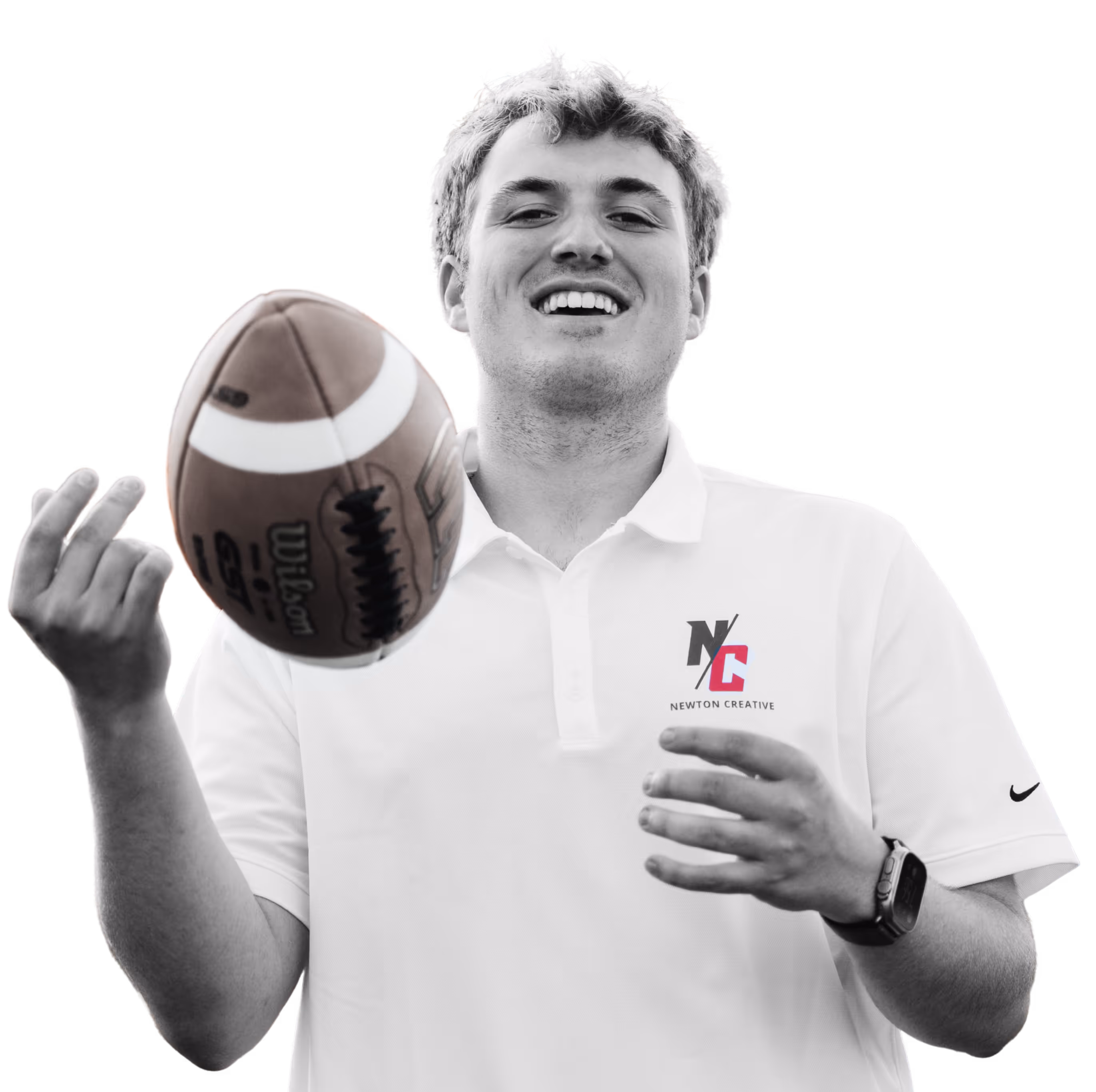 CJ Newton throwing a football in their air.