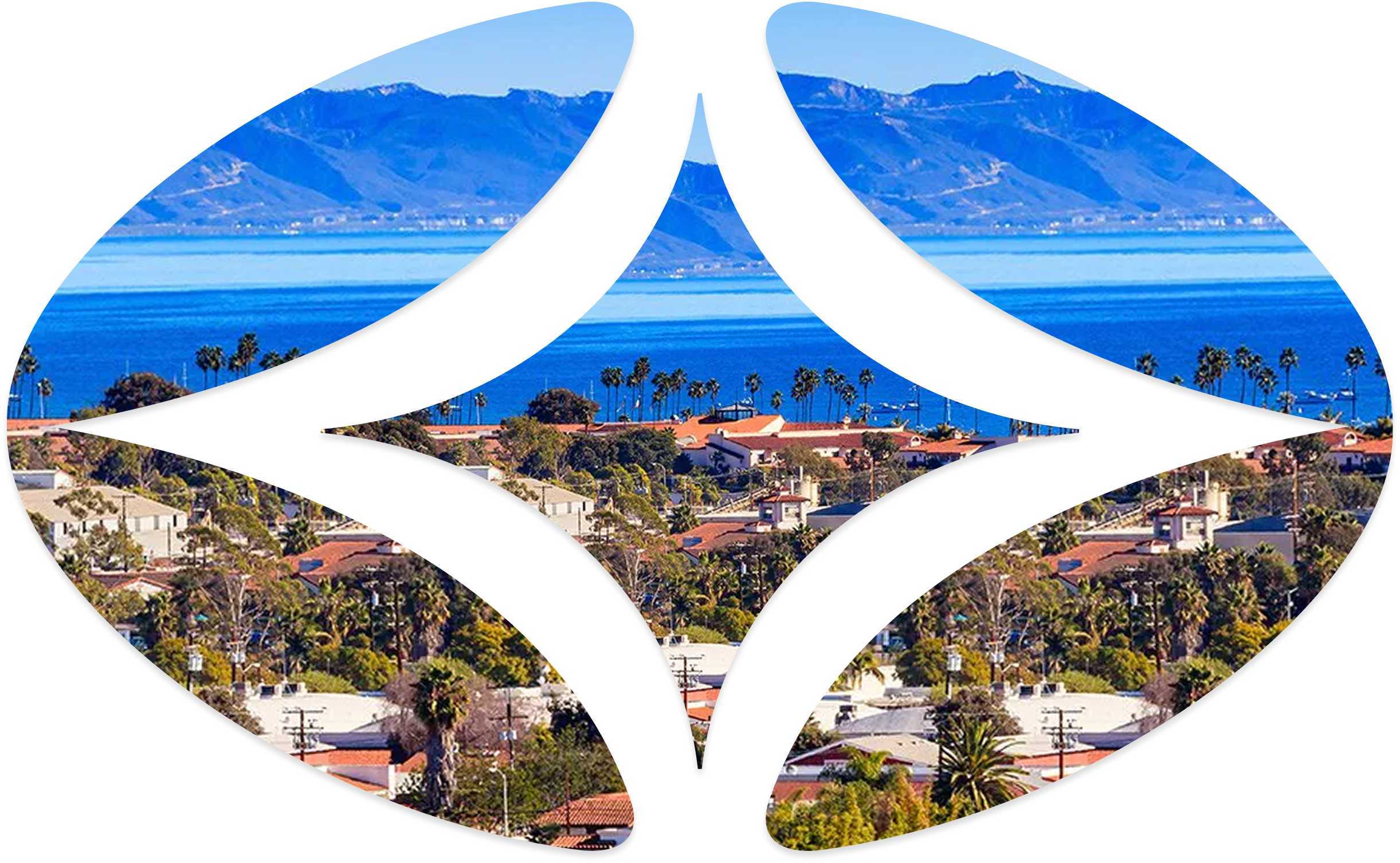 Coastal cityscape with red-tiled roofs, palm trees, and mountains across a blue ocean under a clear sky.