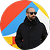 Man wearing sunglasses and a black jacket standing in front of a colorful geometric wall.