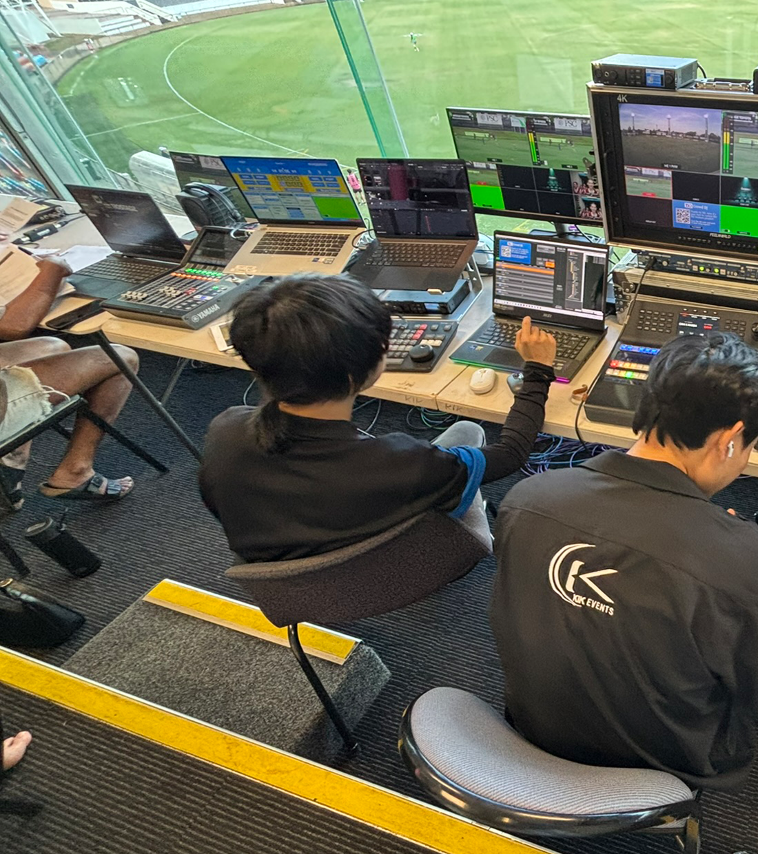 KIK EVENTS team operating live streaming equipment in Darwin, including cameras, vision switchers, and PA systems for weddings, funerals, and sports events.