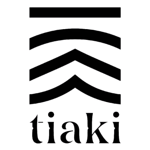 Black geometric logo with three chevron shapes above the word 'tiaki' in lowercase letters.