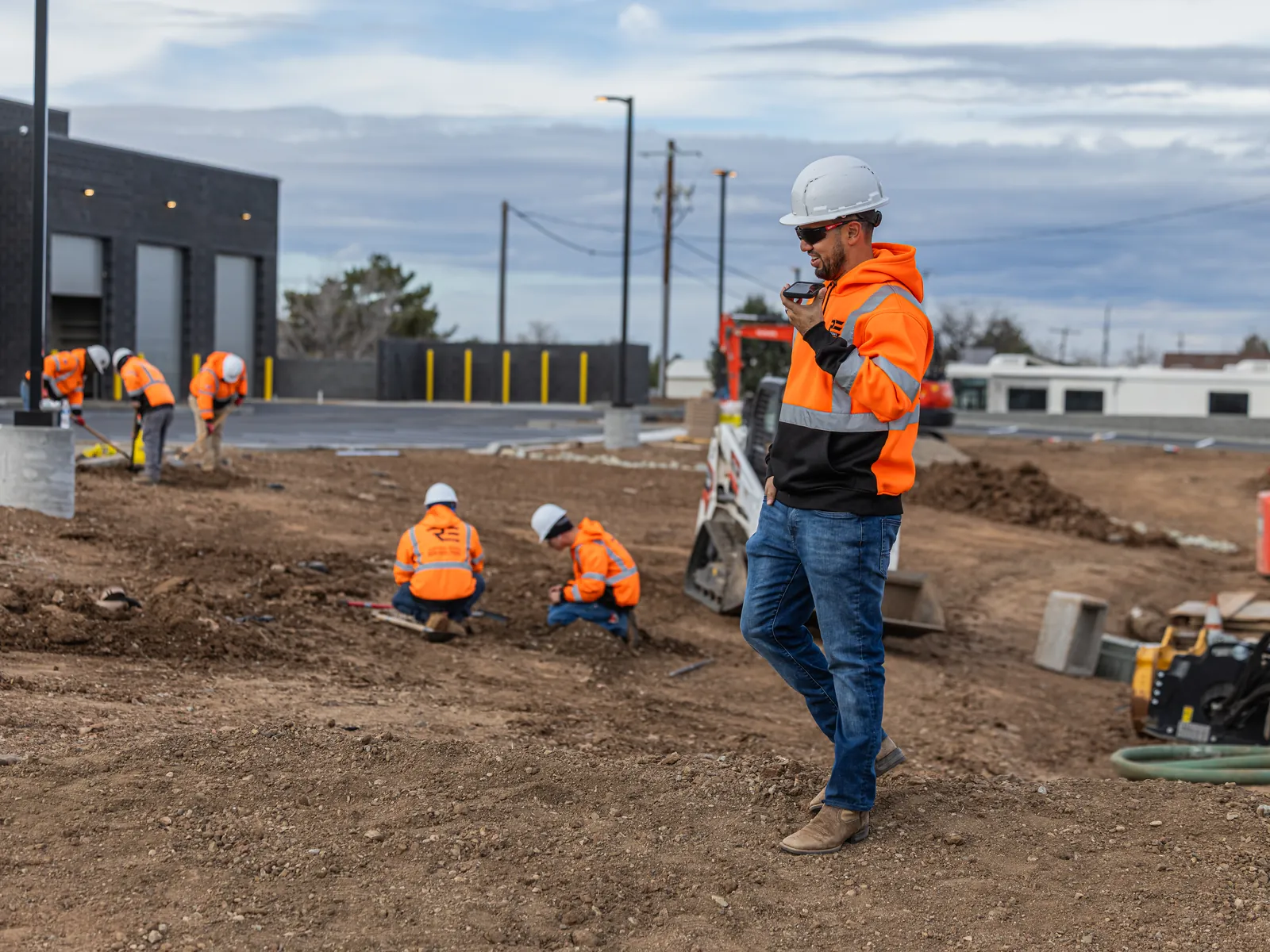 R.E. & Sons crew at work on a commercial site