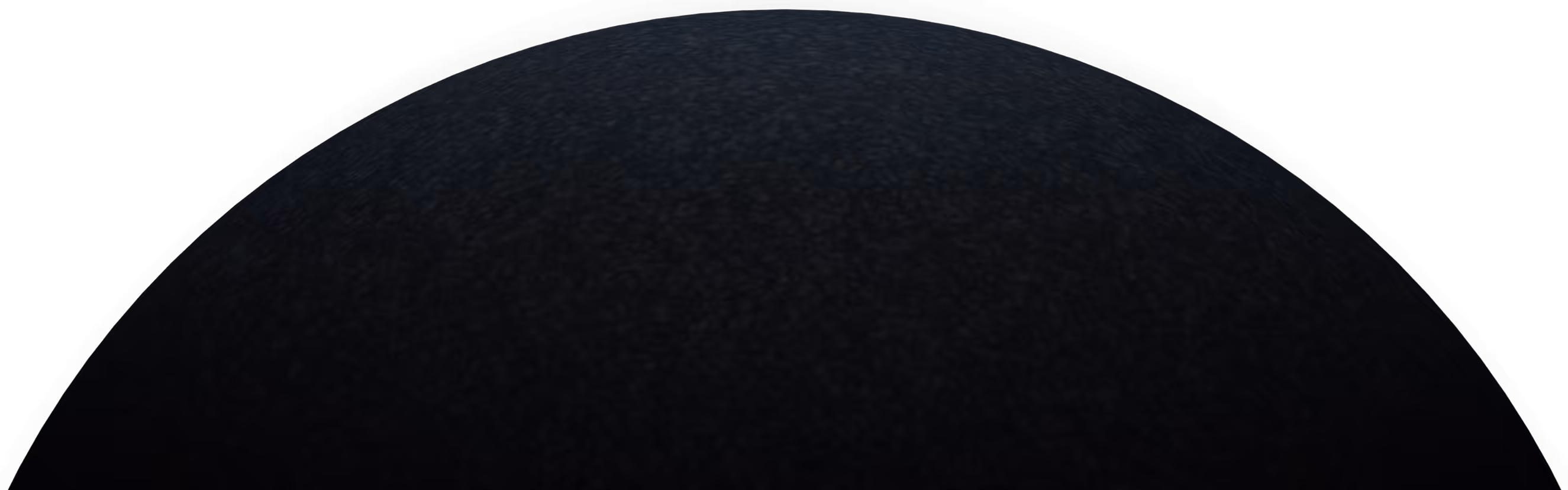 Planeta oscuro con textura granulada sobre fondo negro.