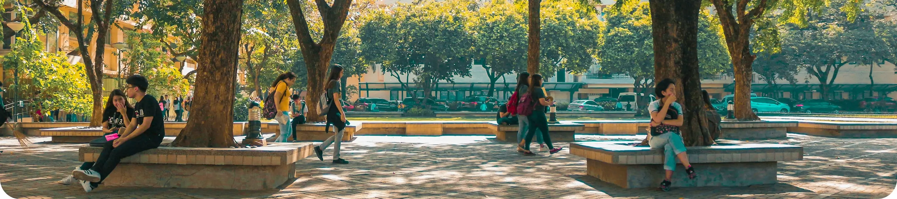 A group of students sitting around in a school