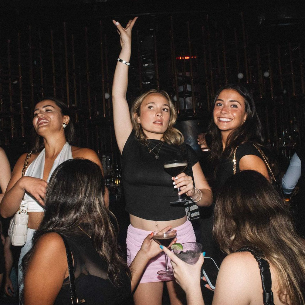 DDNYC party scene in NYC showing the Doginal Dogs community enjoying web3 conversations, creative merch, Dogecoin inscriptions/NFTs, and a shared love for Doge and Doginals.