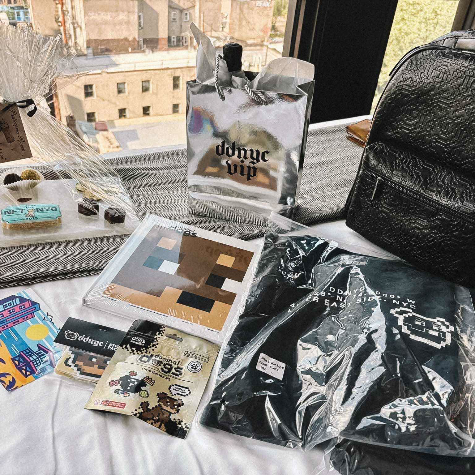 Photo from DDNYC in NYC where the Doginal Dogs community celebrated with friends at a big party, showing off exclusive Doge-inspired merch, inscriptions/NFTs, and the creativity of Dogecoin and Doginals.