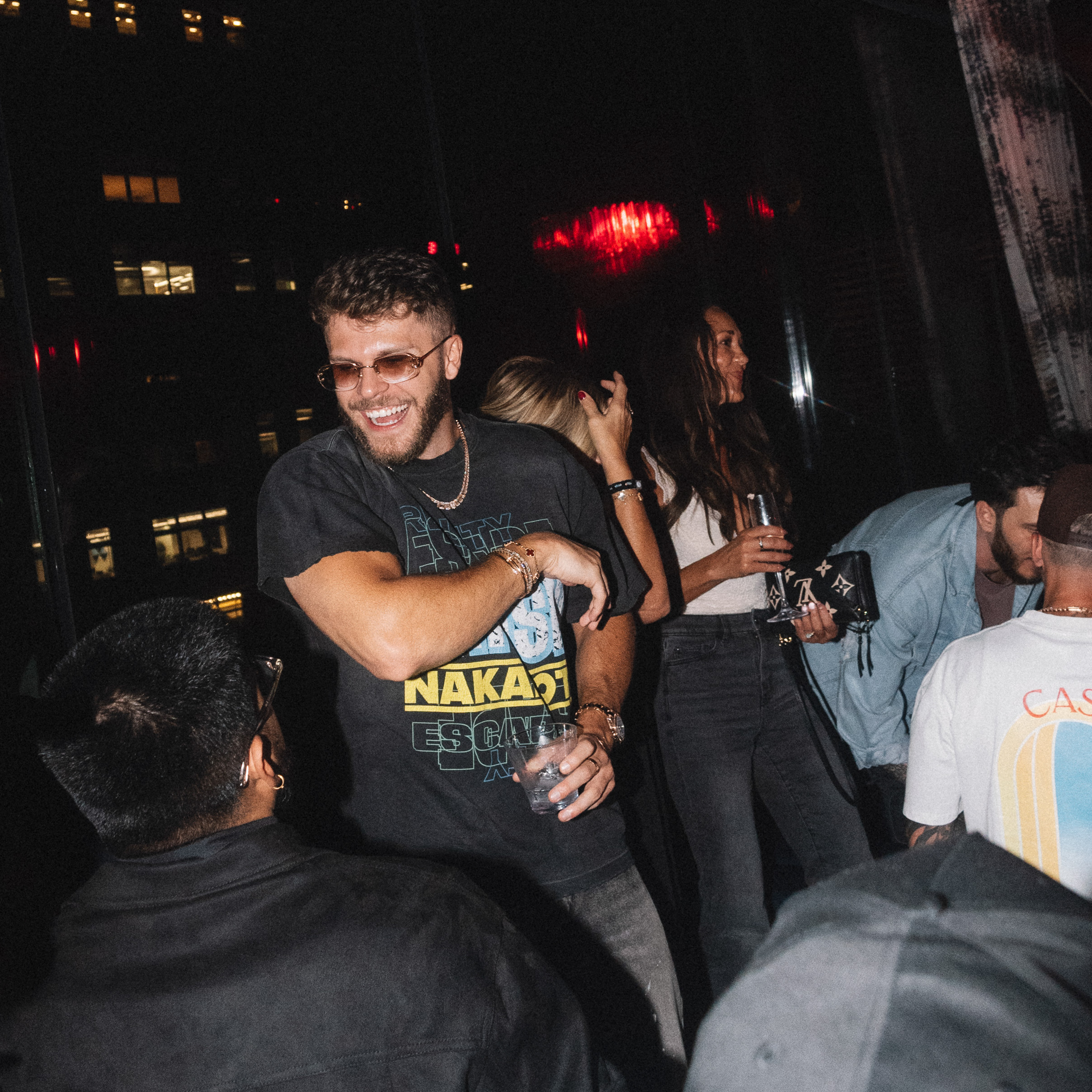 Photo from DDNYC in NYC where the Doginal Dogs community celebrated with friends at a big party, showing off exclusive Doge-inspired merch, inscriptions/NFTs, and the creativity of Dogecoin and Doginals.