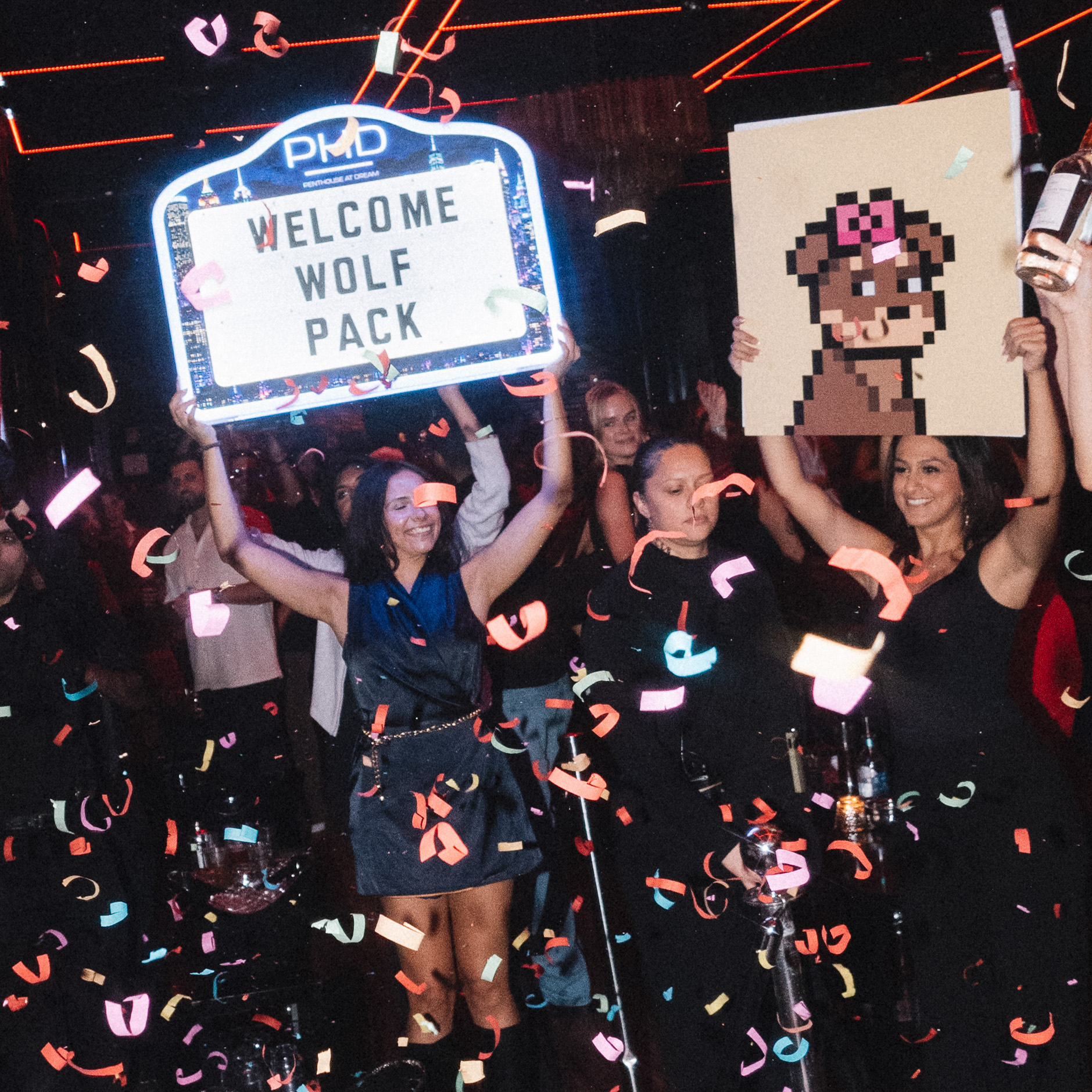 Photo from DDNYC in NYC where the Doginal Dogs community celebrated with friends at a big party, showing off exclusive Doge-inspired merch, inscriptions/NFTs, and the creativity of Dogecoin and Doginals.