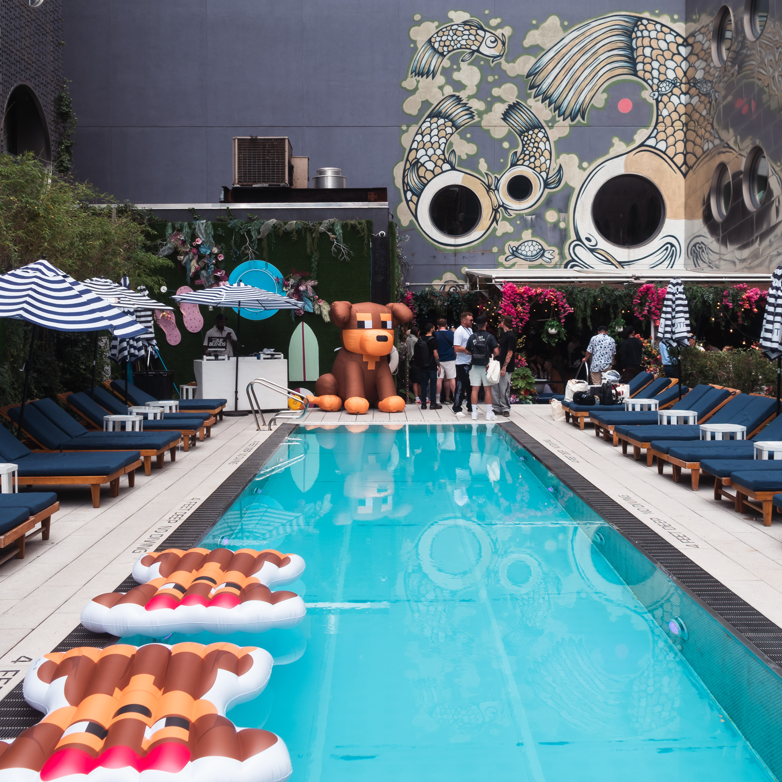 Photo from DDNYC in NYC where the Doginal Dogs community celebrated with friends at a big party, showing off exclusive Doge-inspired merch, inscriptions/NFTs, and the creativity of Dogecoin and Doginals.