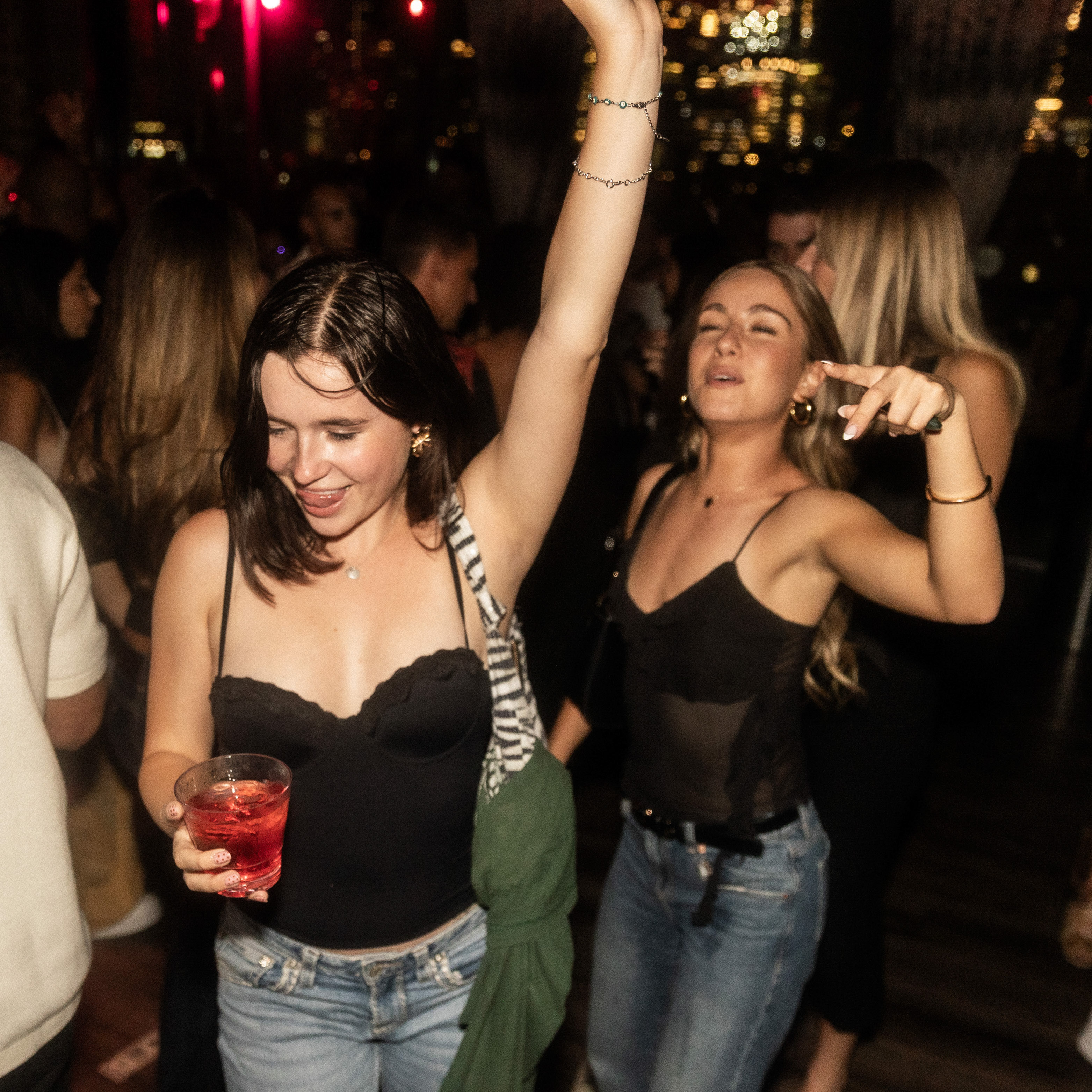 Photo from DDNYC in NYC where the Doginal Dogs community celebrated with friends at a big party, showing off exclusive Doge-inspired merch, inscriptions/NFTs, and the creativity of Dogecoin and Doginals.