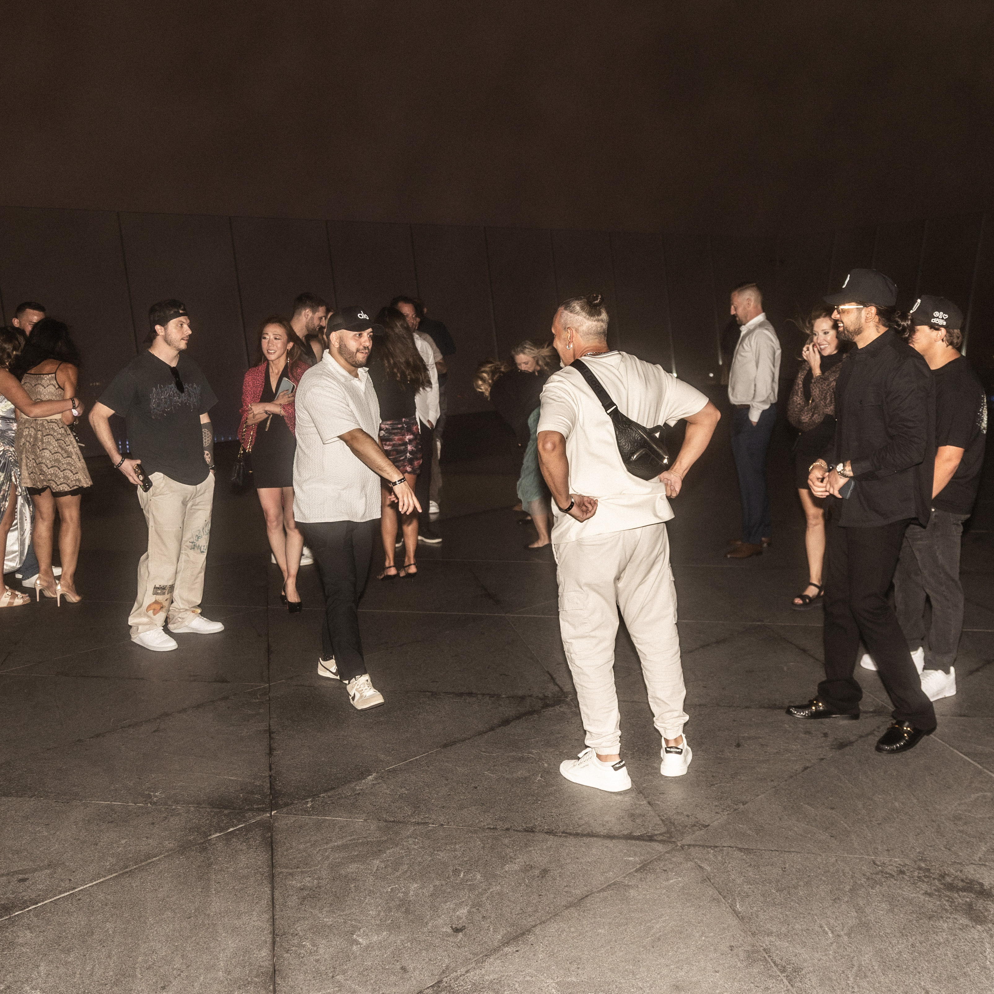 Photo from DDNYC in NYC where the Doginal Dogs community celebrated with friends at a big party, showing off exclusive Doge-inspired merch, inscriptions/NFTs, and the creativity of Dogecoin and Doginals.