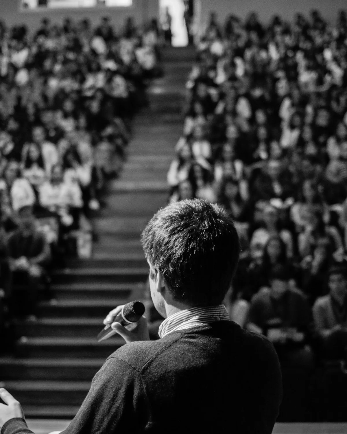 Event and Webinar Demand — man speaking in front of crowd