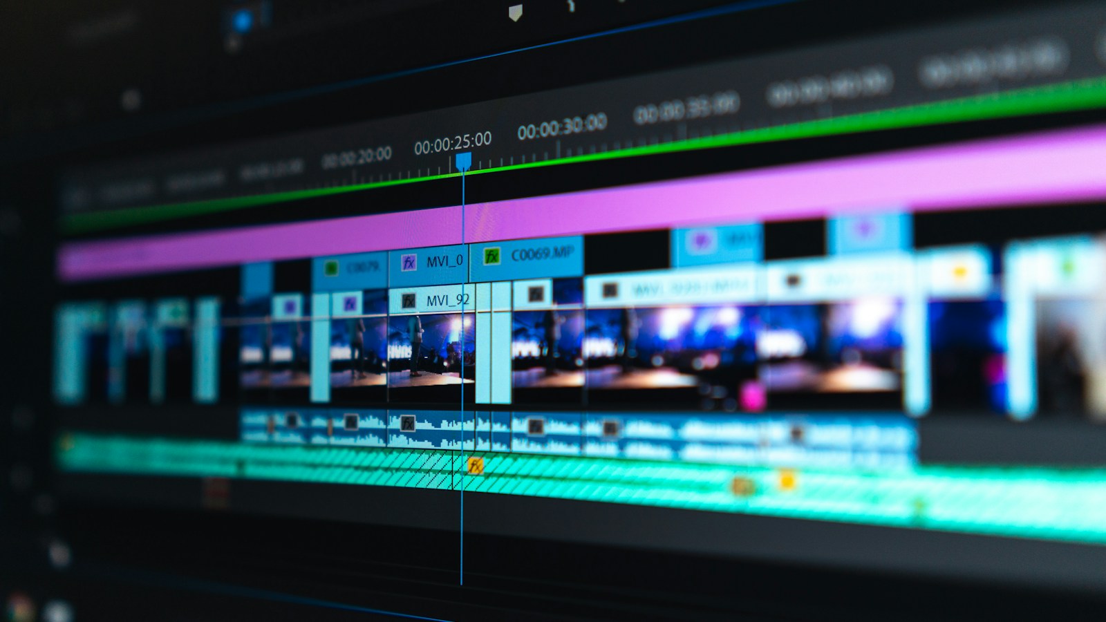 Video editing timeline with clips on a dark screen