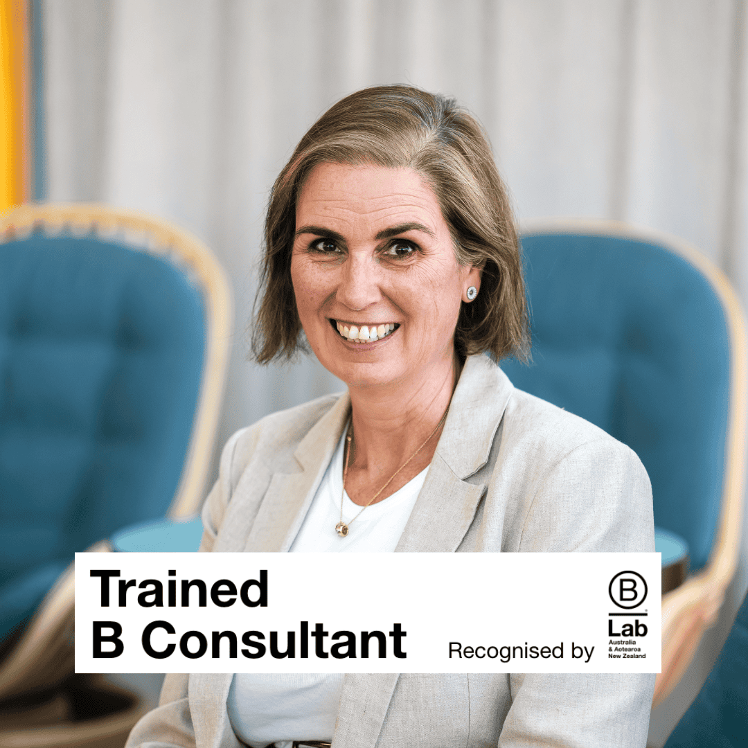 female in ecru jacket with text trained b corp consultant