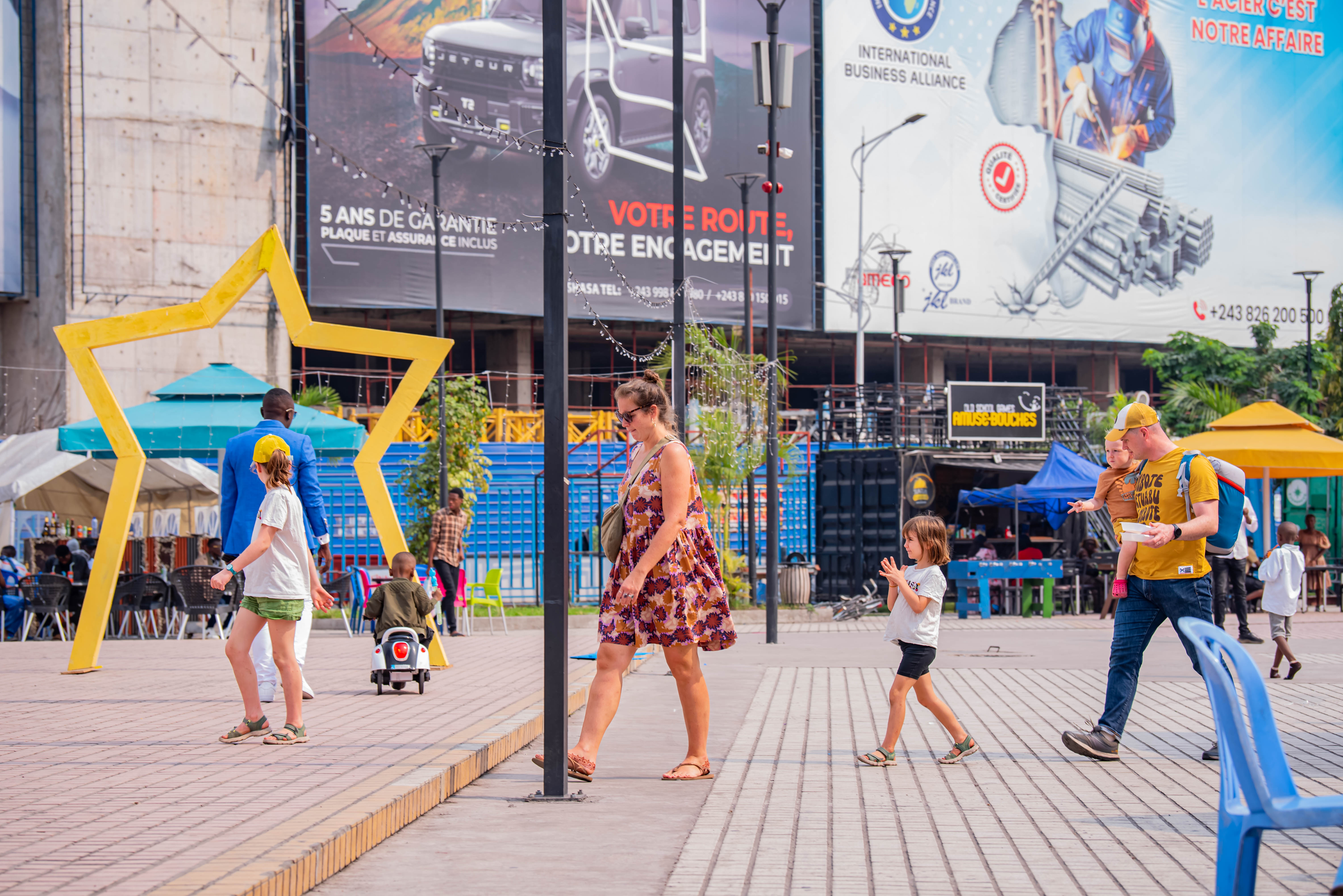 image of park with people enjoying rides (for an amusement park)