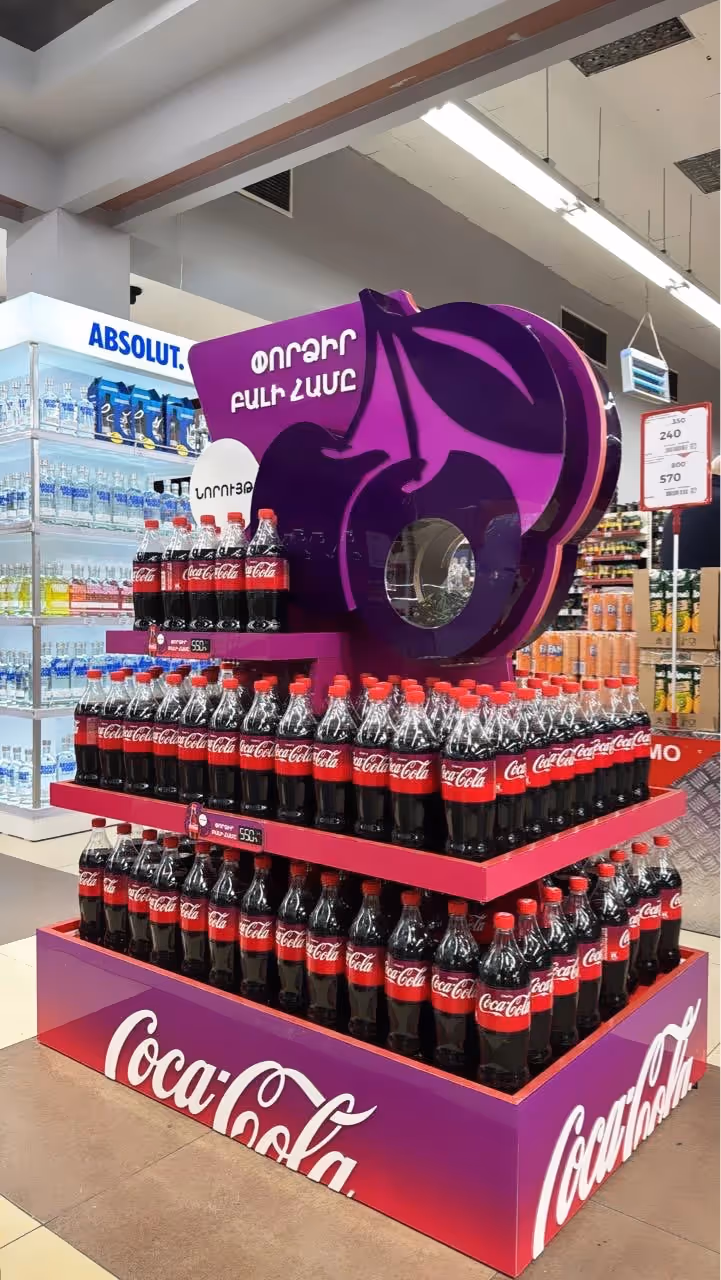 Coca Cola shelfs in Supermarket