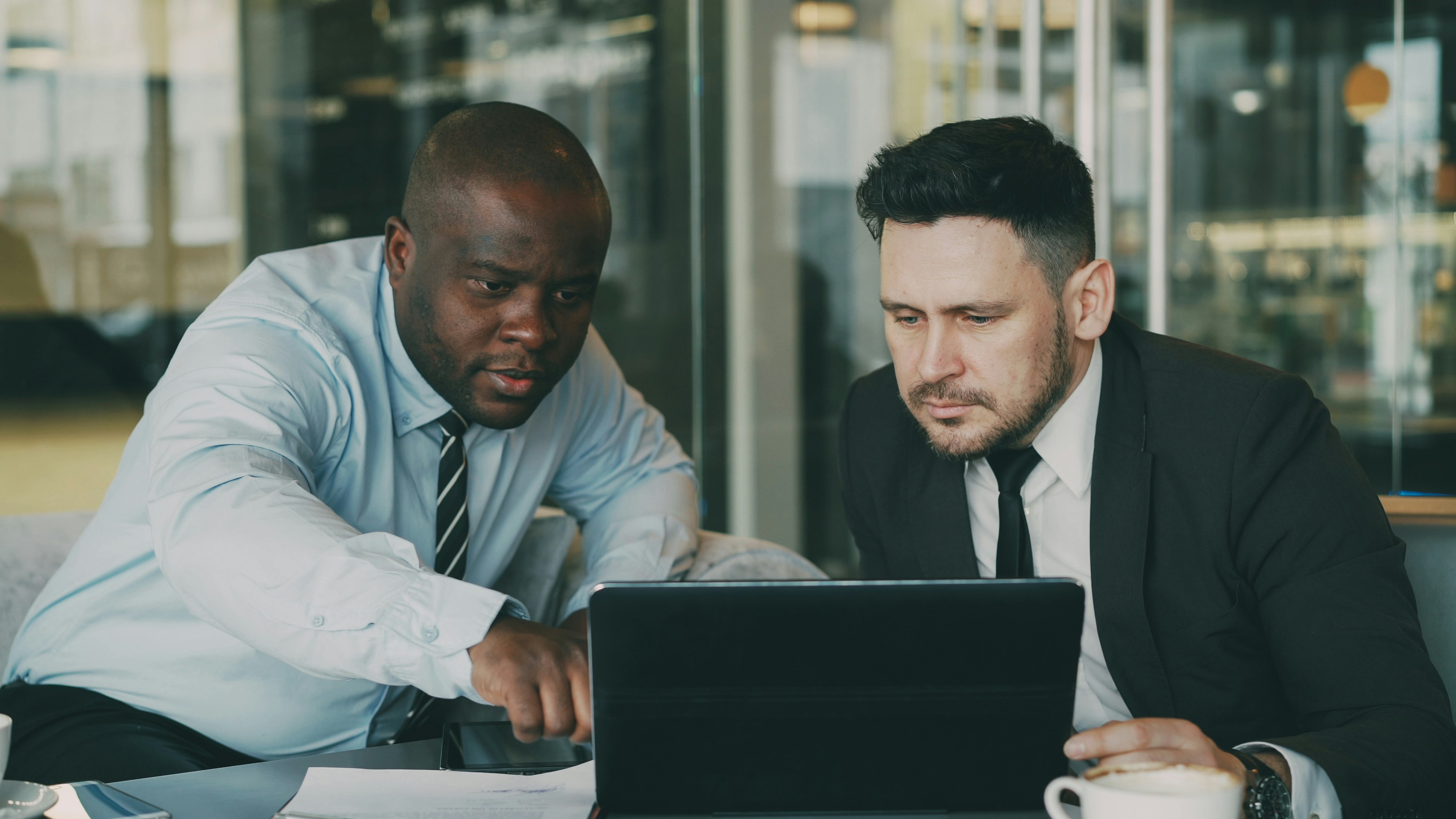Lawyer helping client with joint venture agreement