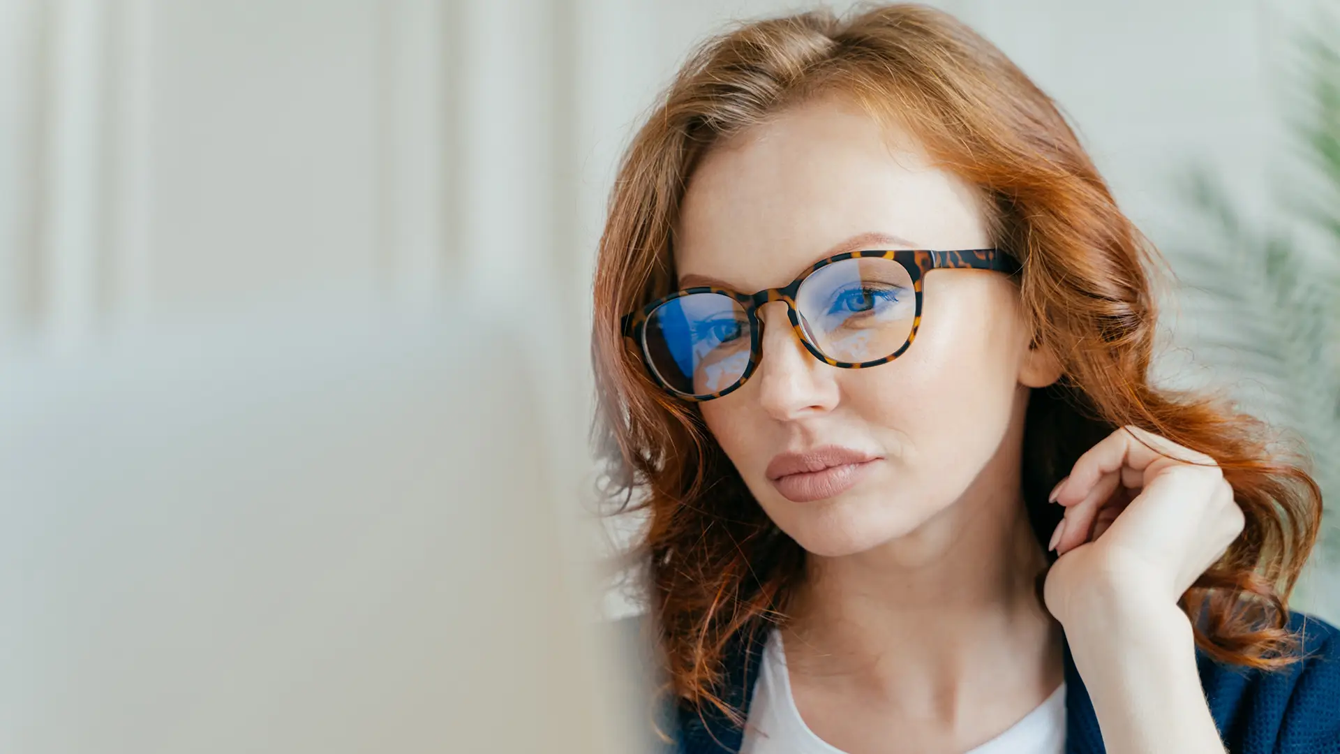 Woman working at computer with Zylpha secure file sharing