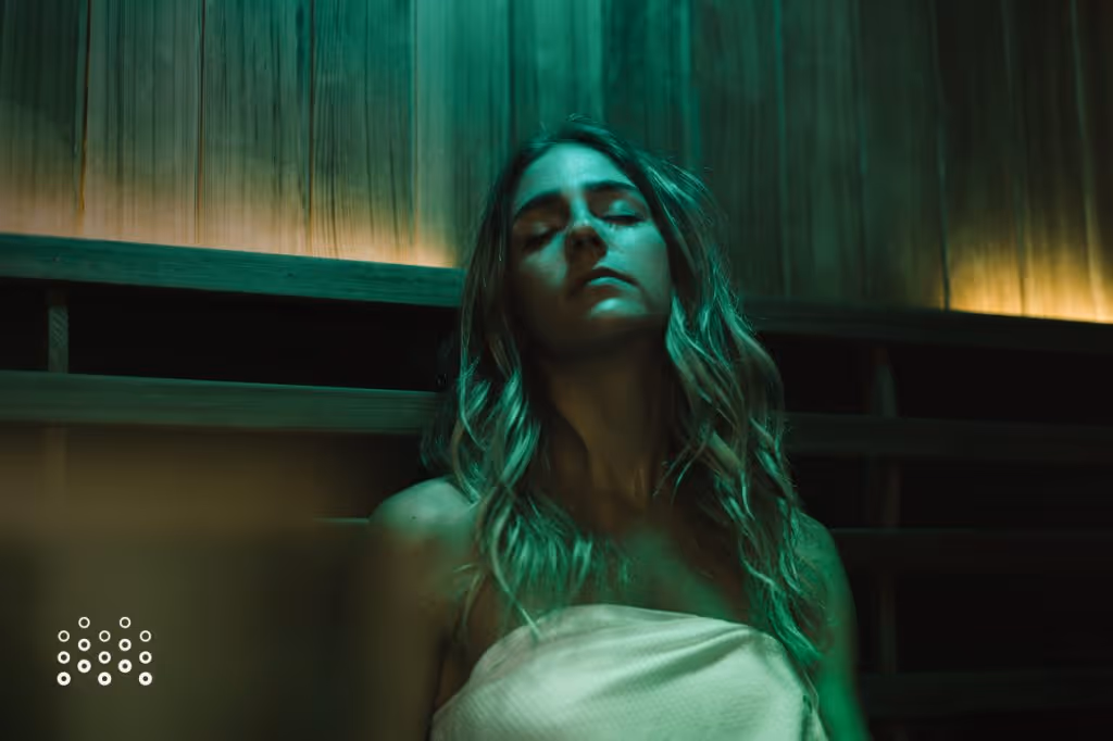 Woman relaxing in infrared sauna