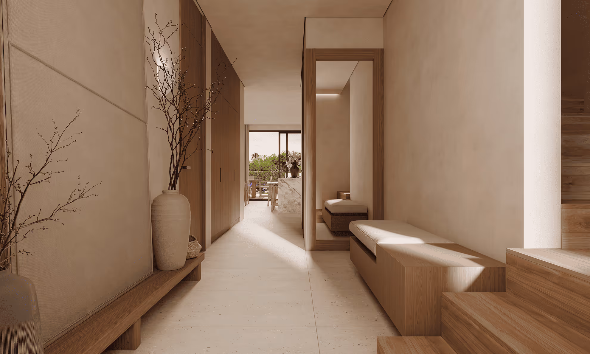 Minimalist hallway with wooden bench, beige cushions, large wall mirror, and vases with bare branches, leading to a sunlit dining area.