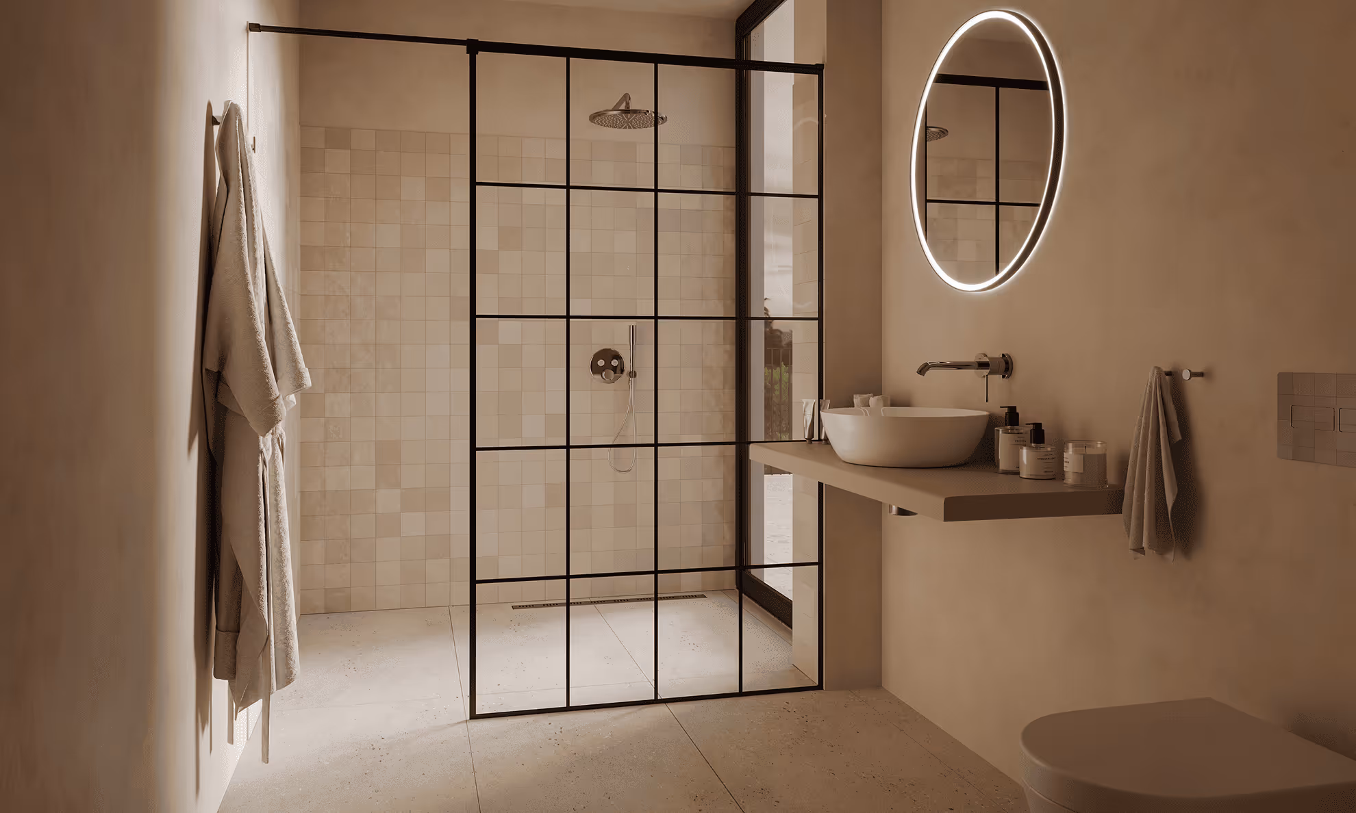 Minimalist bathroom with beige walls, a walk-in shower with black grid glass, a floating sink countertop, illuminated round mirror, and hanging towels.