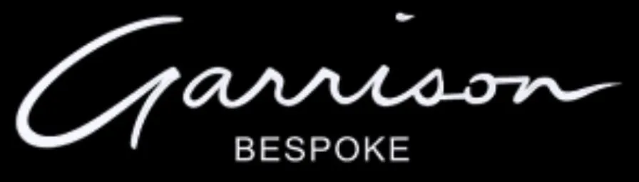 Garrison Bespoke logo with white cursive text on a black background.