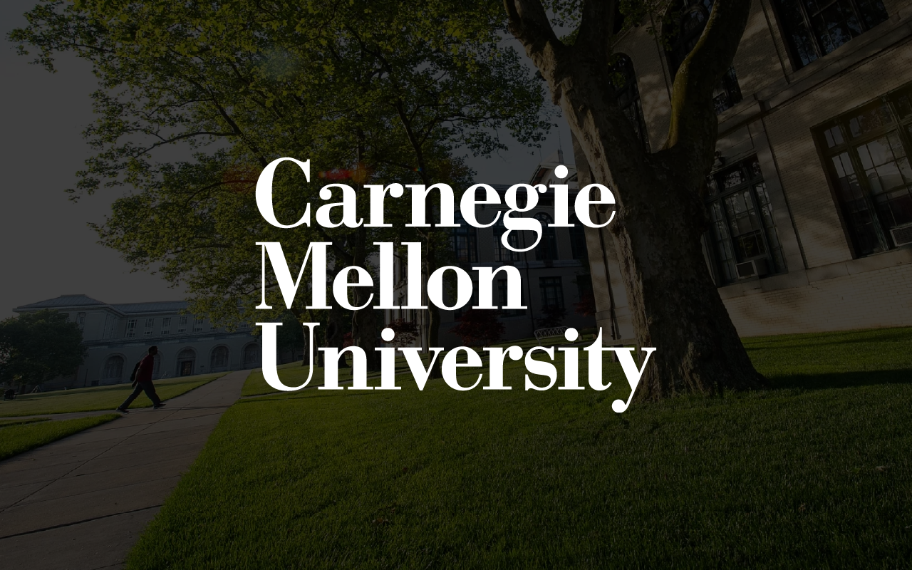 Carnegie Mellon University text overlay on campus scene with trees, grass, sidewalk, and buildings.