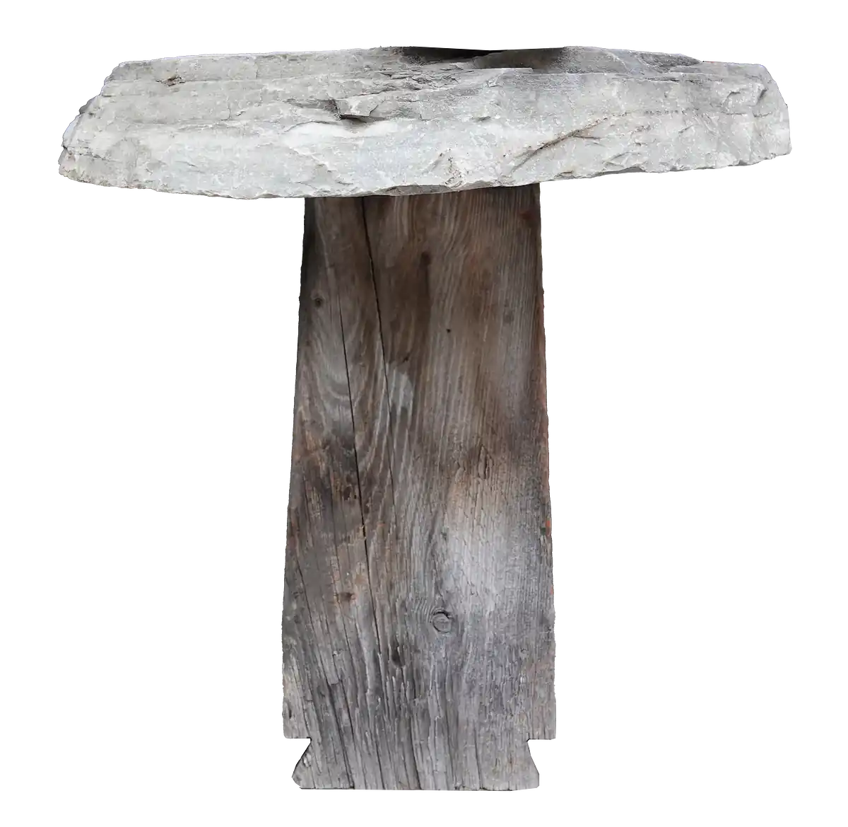 Flat stone slab resting on a rustic wooden pedestal