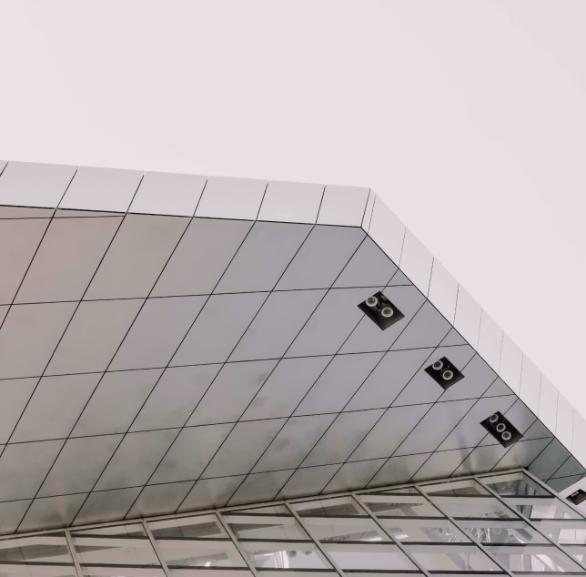 Modern glass office building seen from below