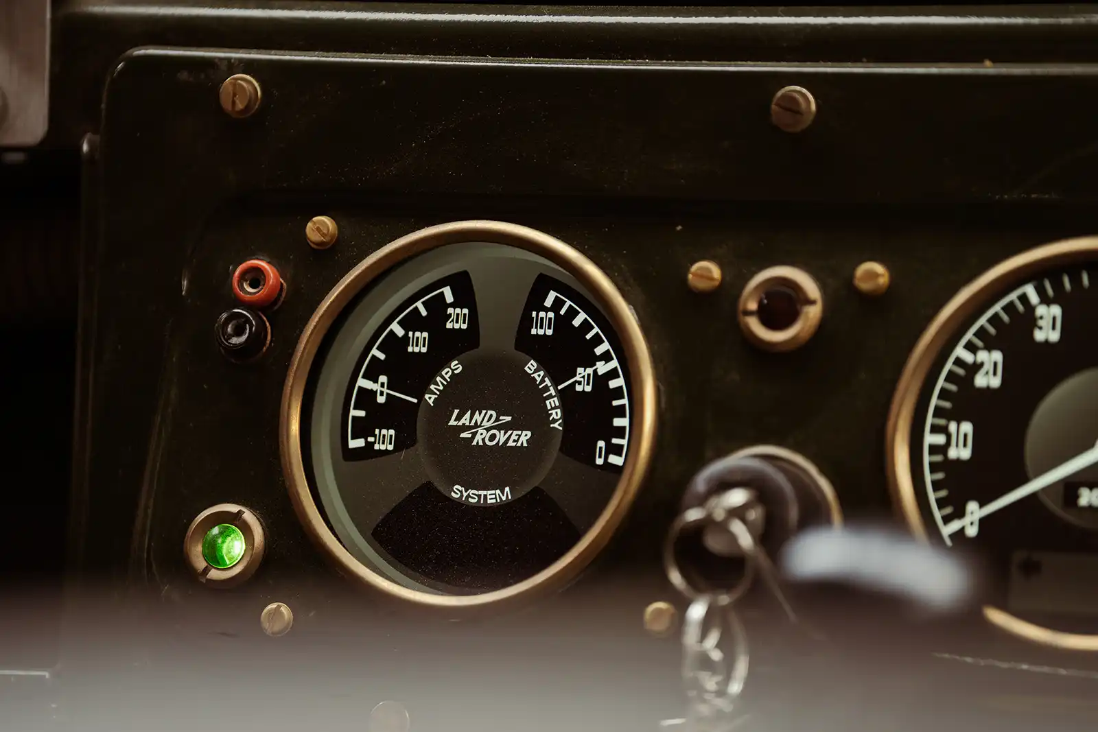 Vintage Land Rover dashboard with amps and battery meters