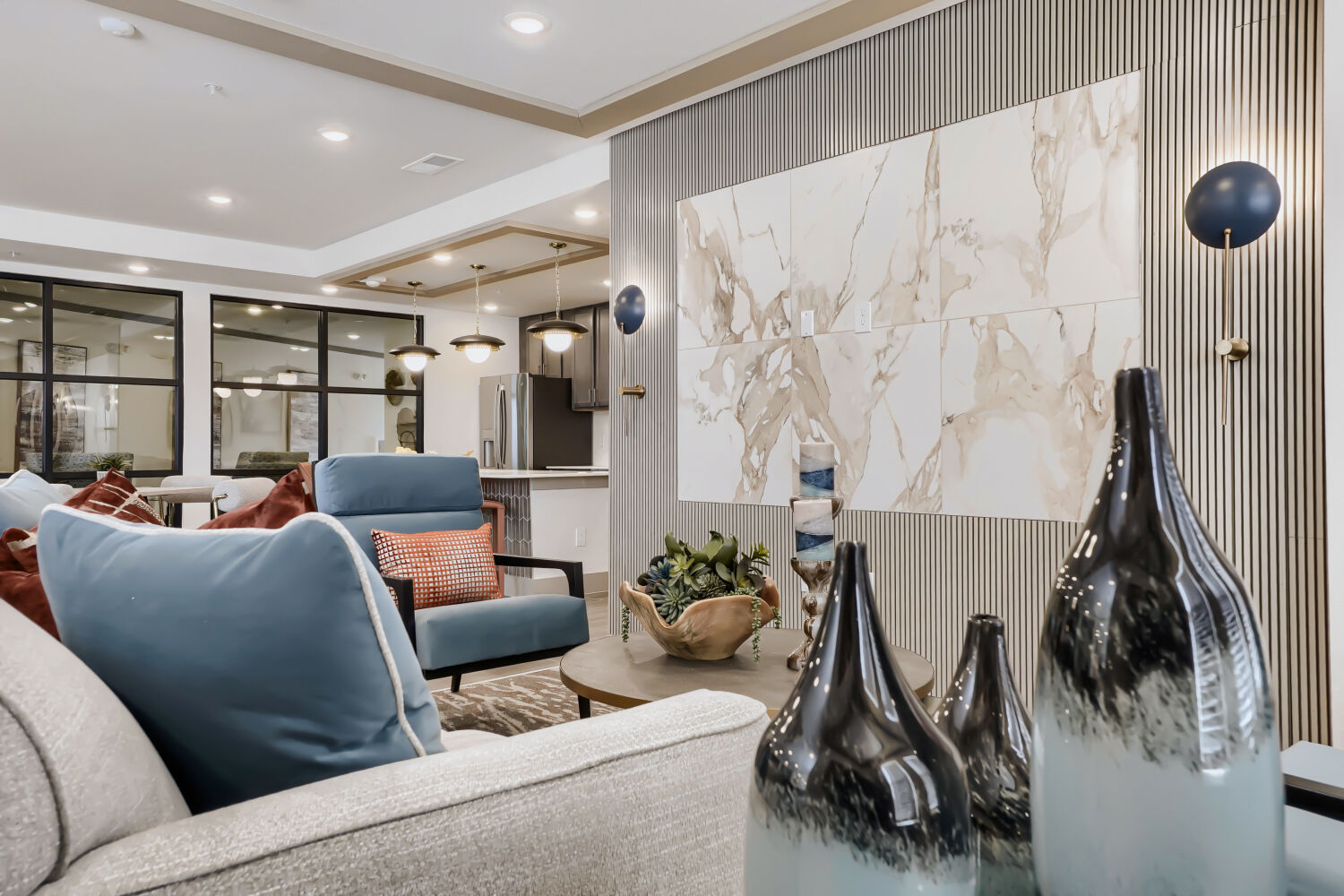 Clubhouse with seating area and kitchen