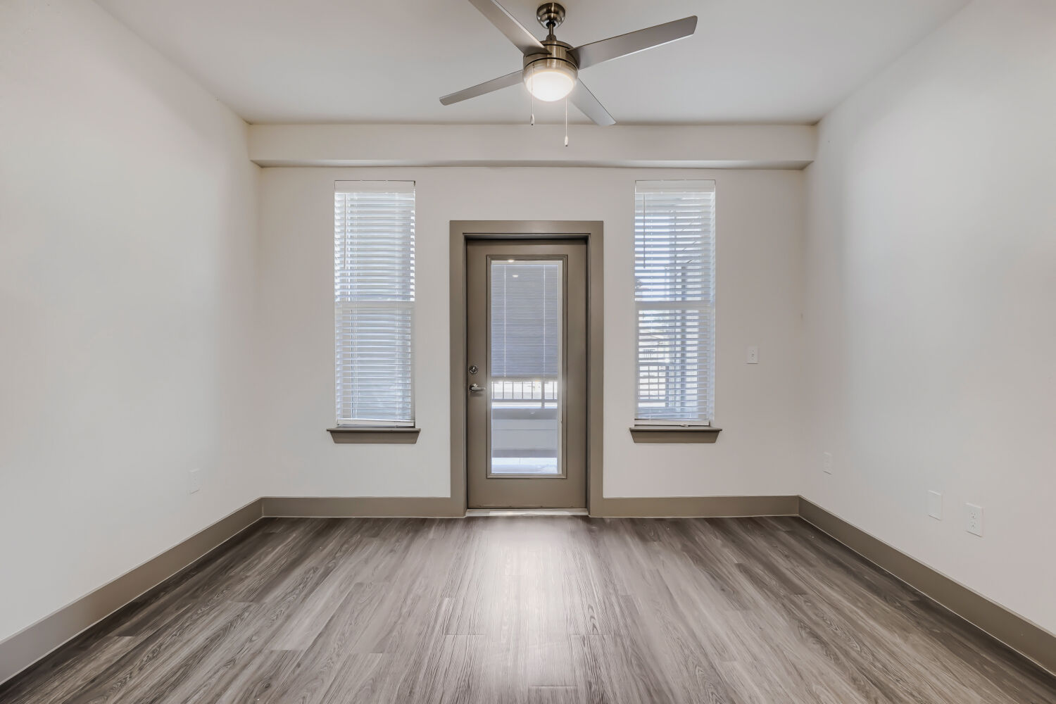 Unfurnished dining area with large windows