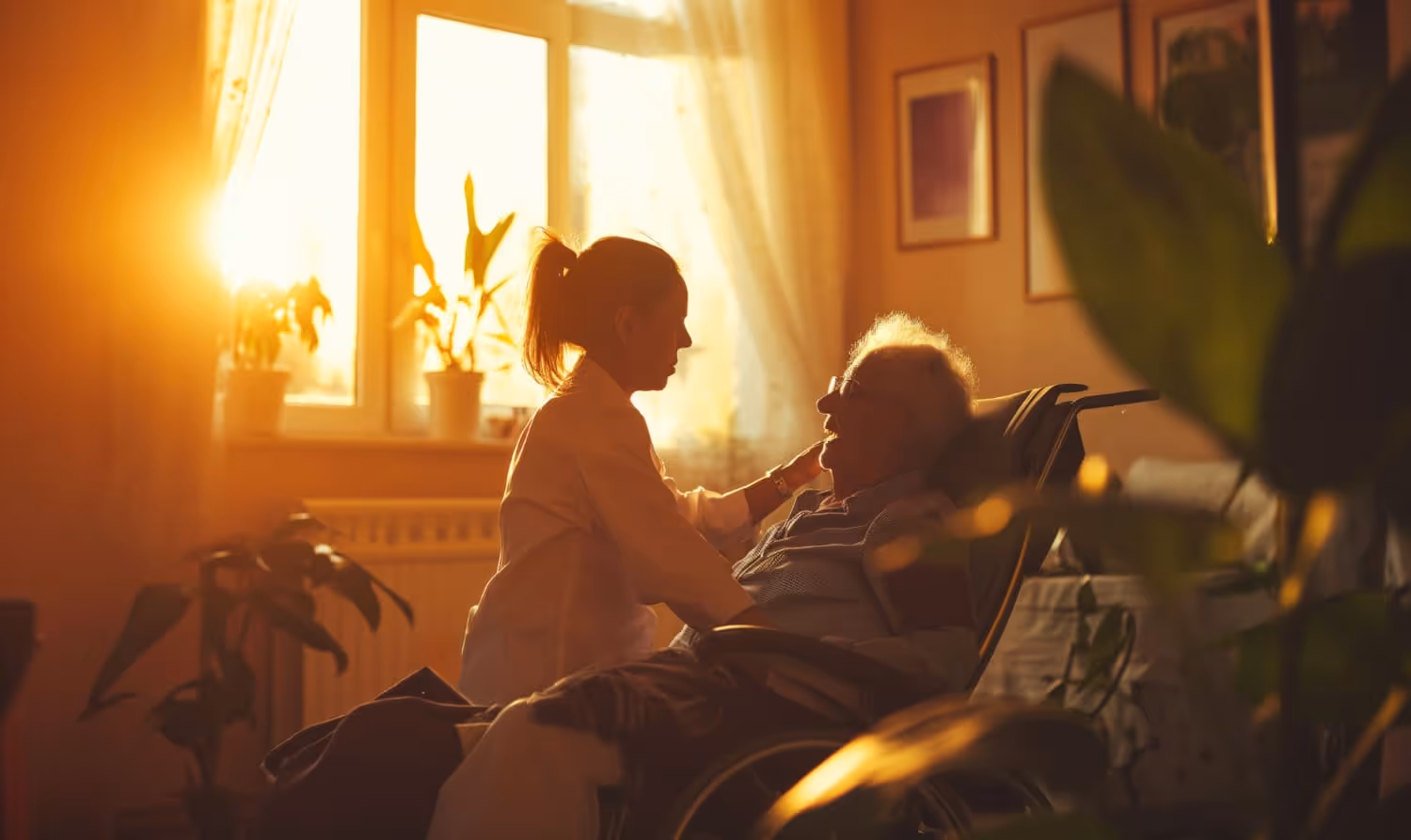 Child using a wheelchair with a family caregiver in the home entryway