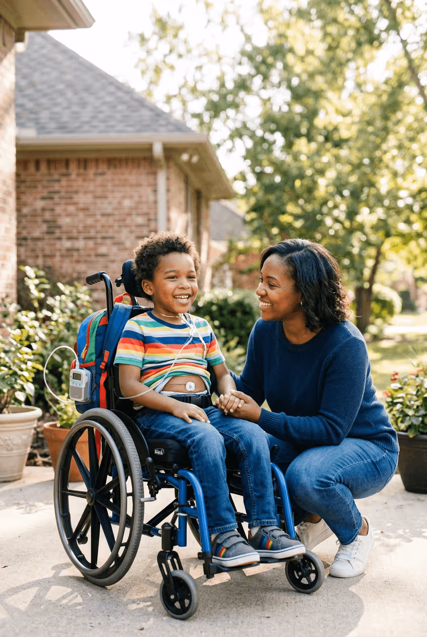 Child using a wheelchair with a family caregiver in the home entryway