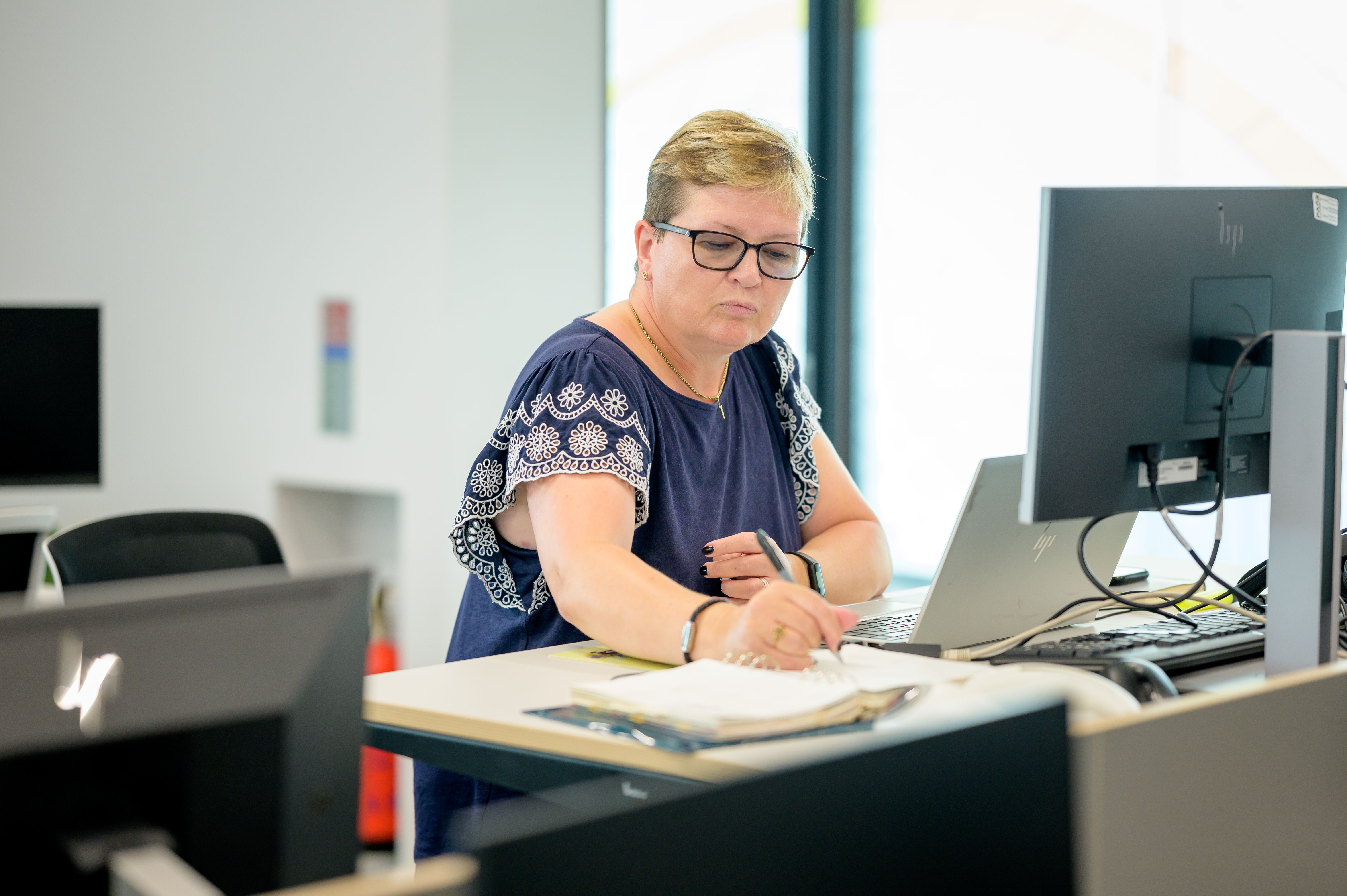 Photo of person working at a desk