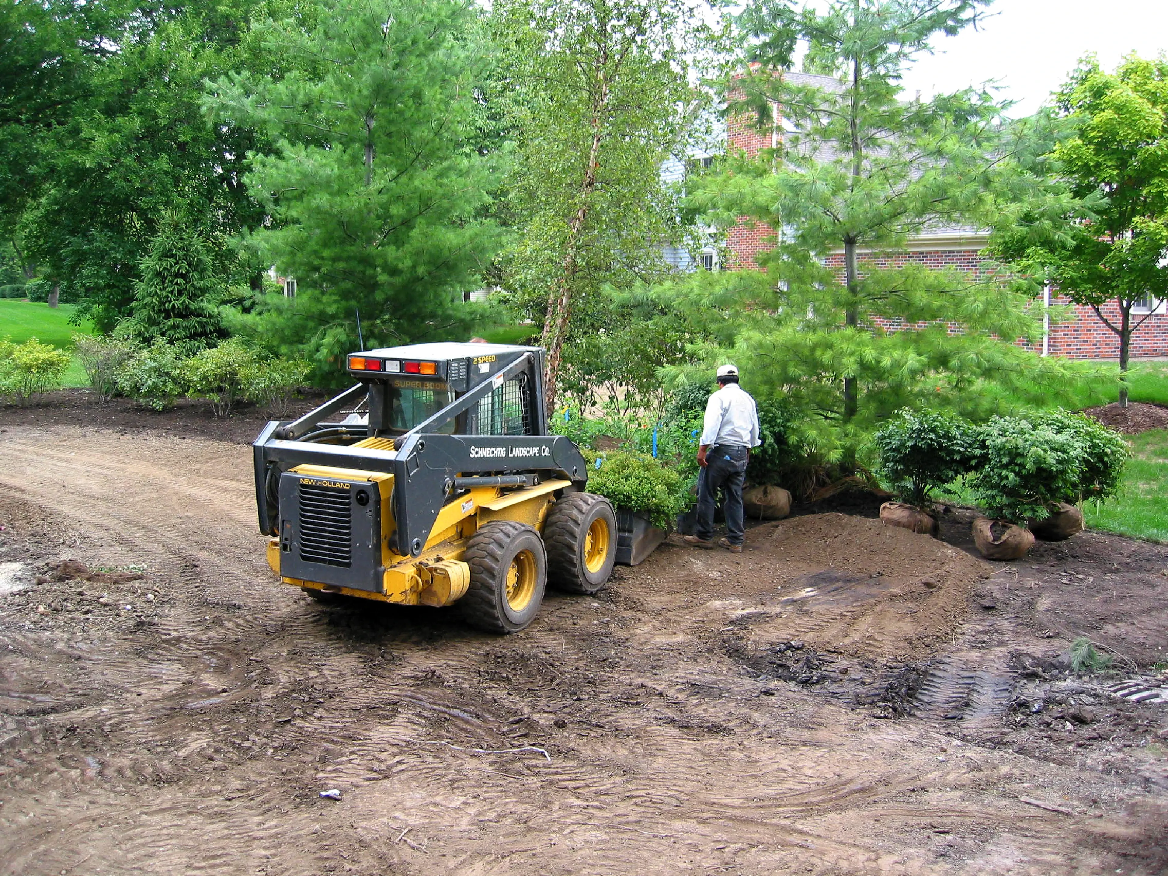 Landscape equipment removing bushes