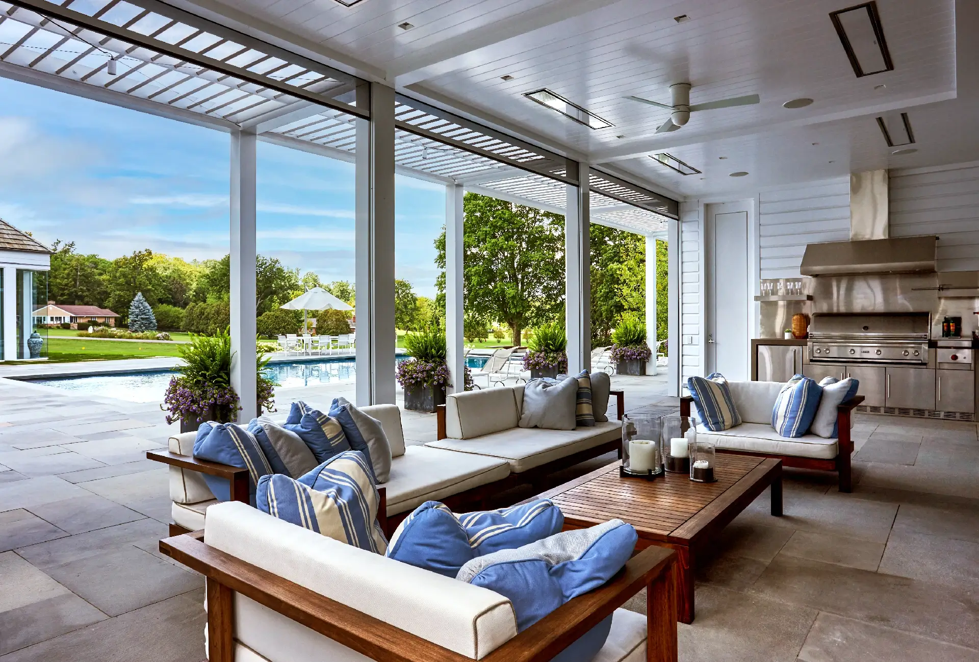 Indoor outdoor lanai with furniture and pergola