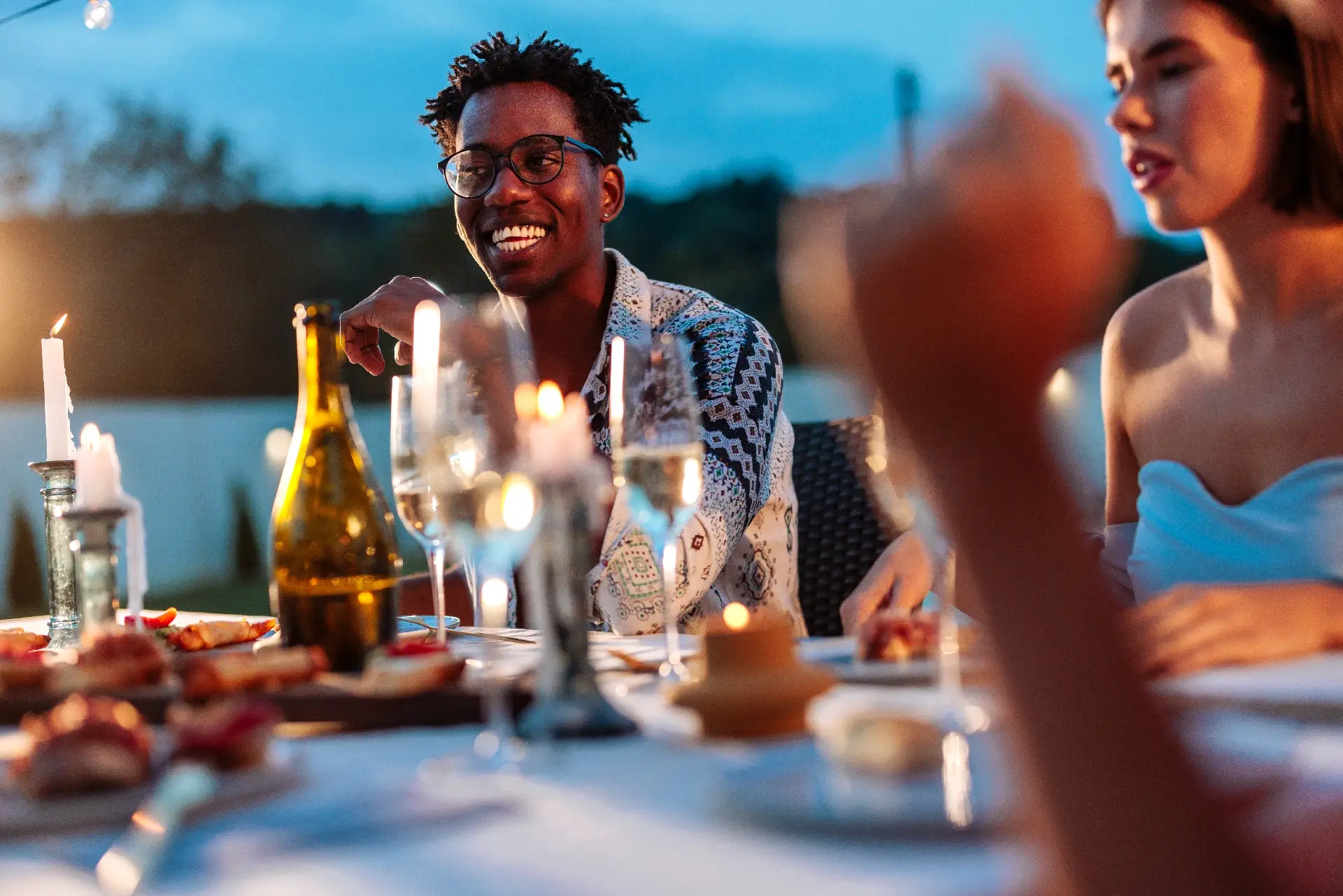 Friends enjoying outdoor dinner