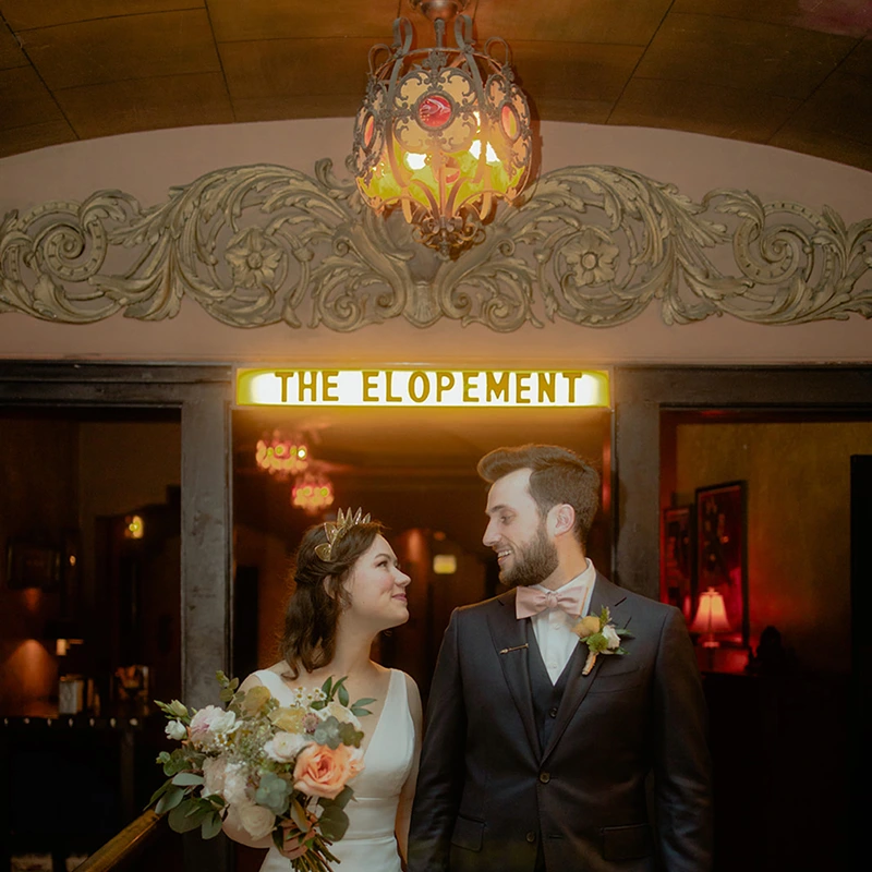 A photo of the newlyweds in a cinema theatre
