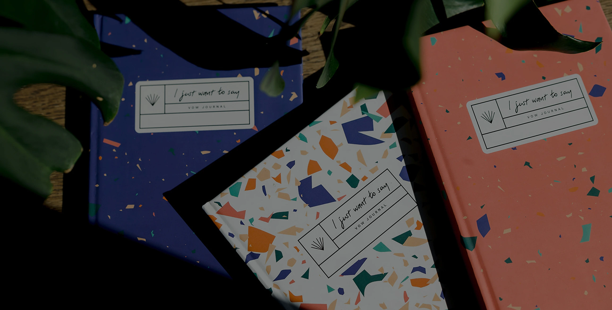 A photo of "I just want to say" vow journals.