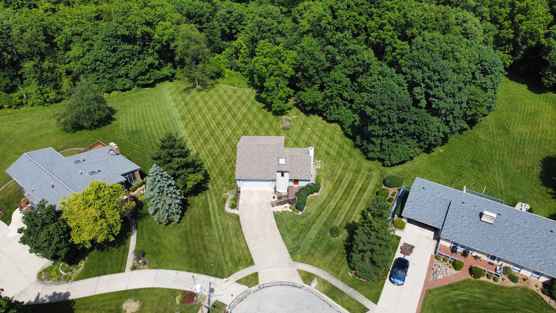 Aerial view of residential landscaping and hardscaping near me