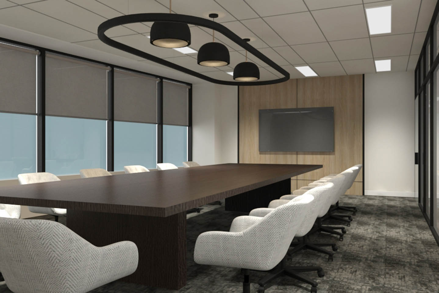 Modern conference room with long dark wood table, upholstered swivel chairs, pendant lighting, window shades, and wall-mounted display.