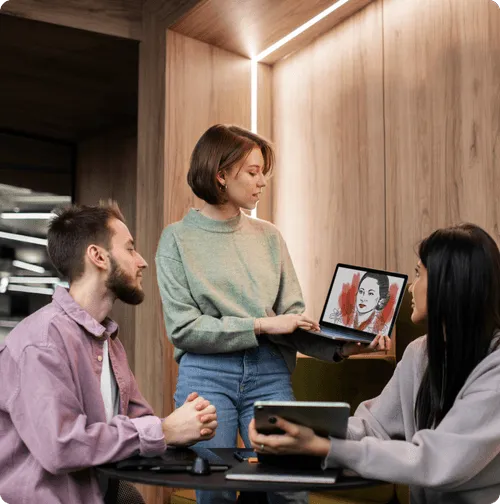 Team members collaborating in a strategy discussion, representing the collaborative approach behind Link Barista’s founding and methodology.