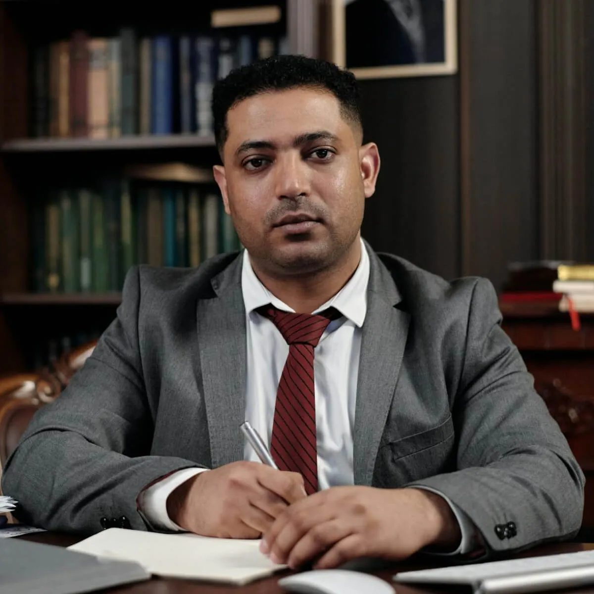 businessman signing a document
