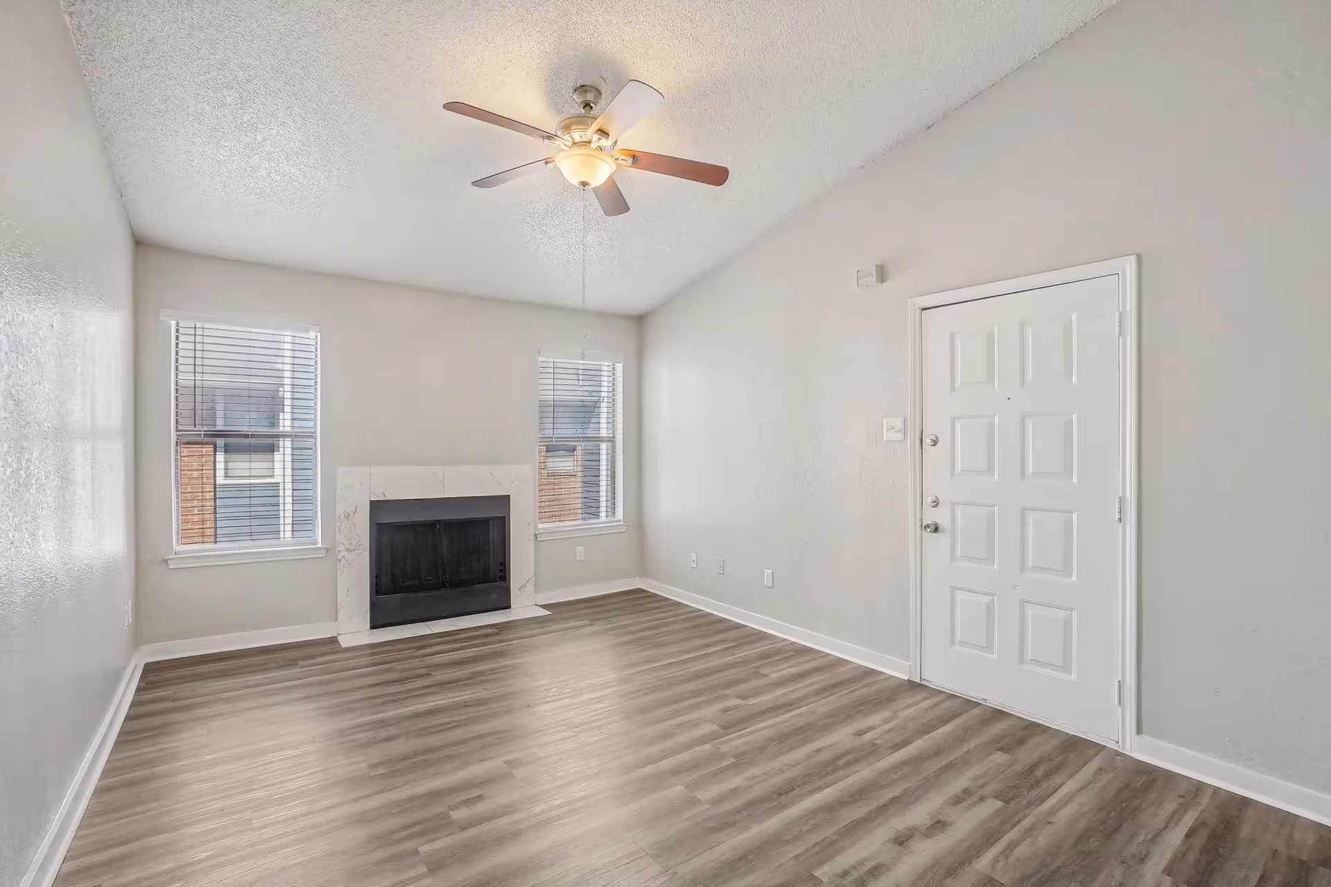 Empty living room with fire place