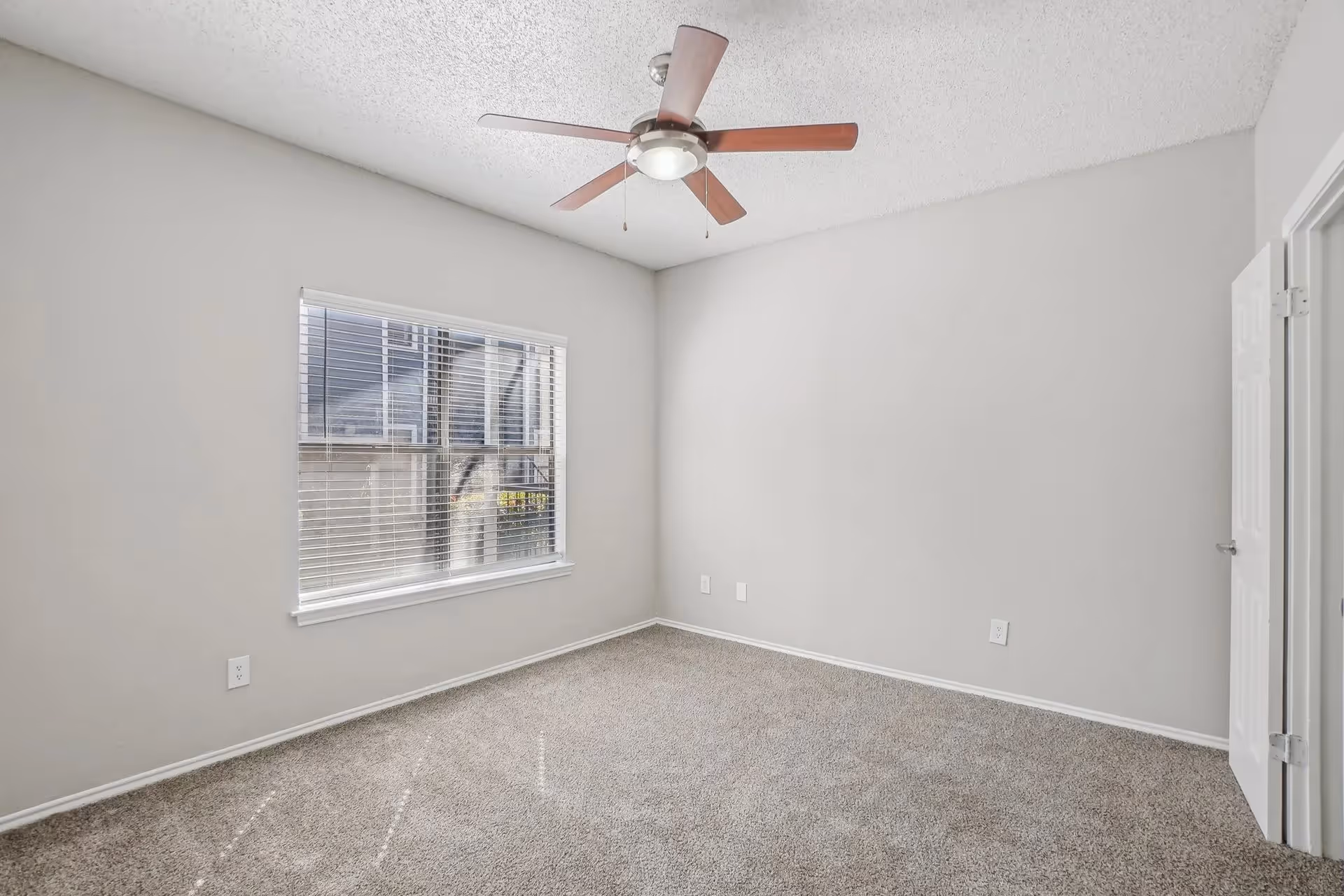 Empty bedroom with carpet
