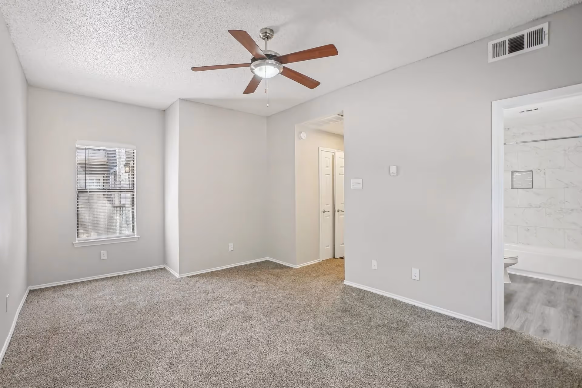 Empty bedroom with carpet