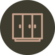 Ícono de armario con tres puertas sobre fondo circular oscuro.